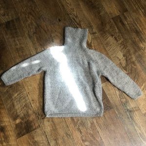 Grey  wool knit ane Klein turtle neck sweater .